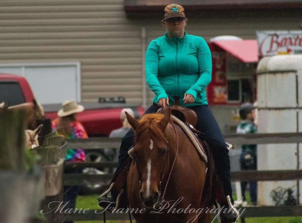 Amanda on her horse, volunteering at 4-H event